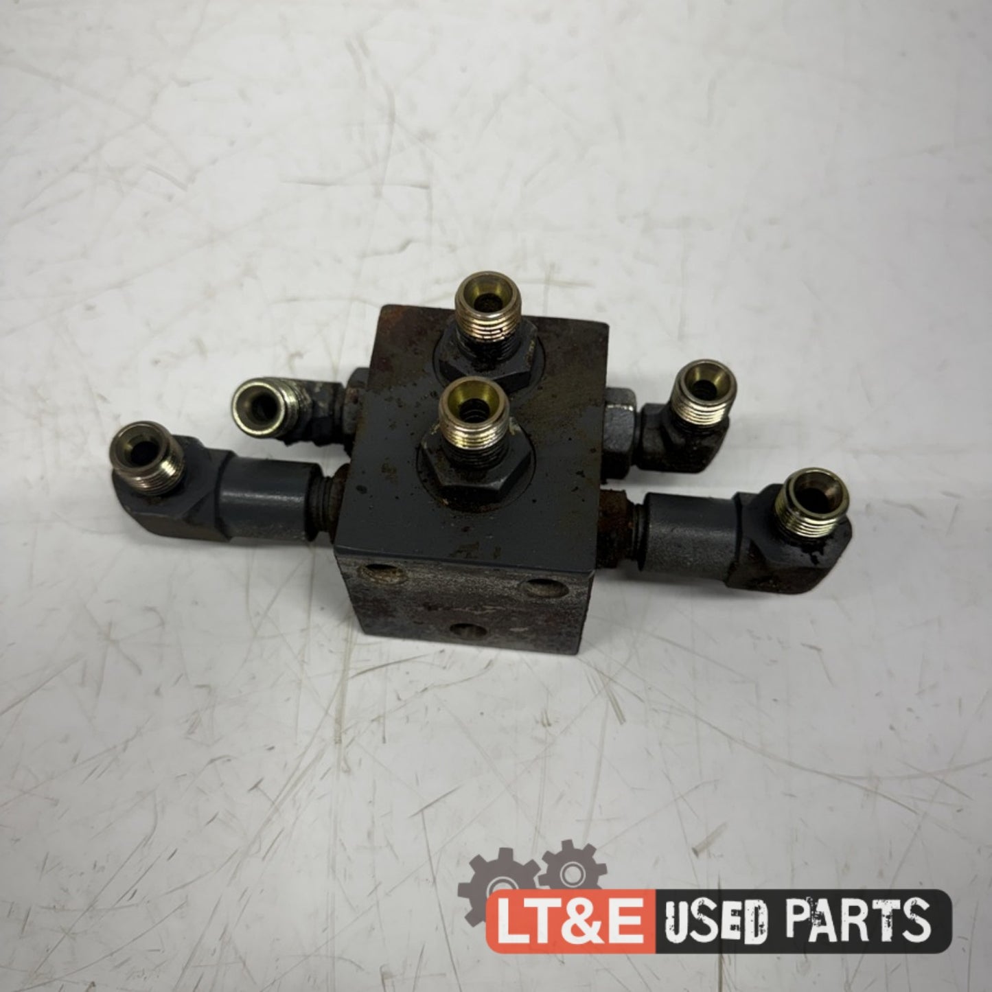 STEERING HOSE JUNCTION BLOCK