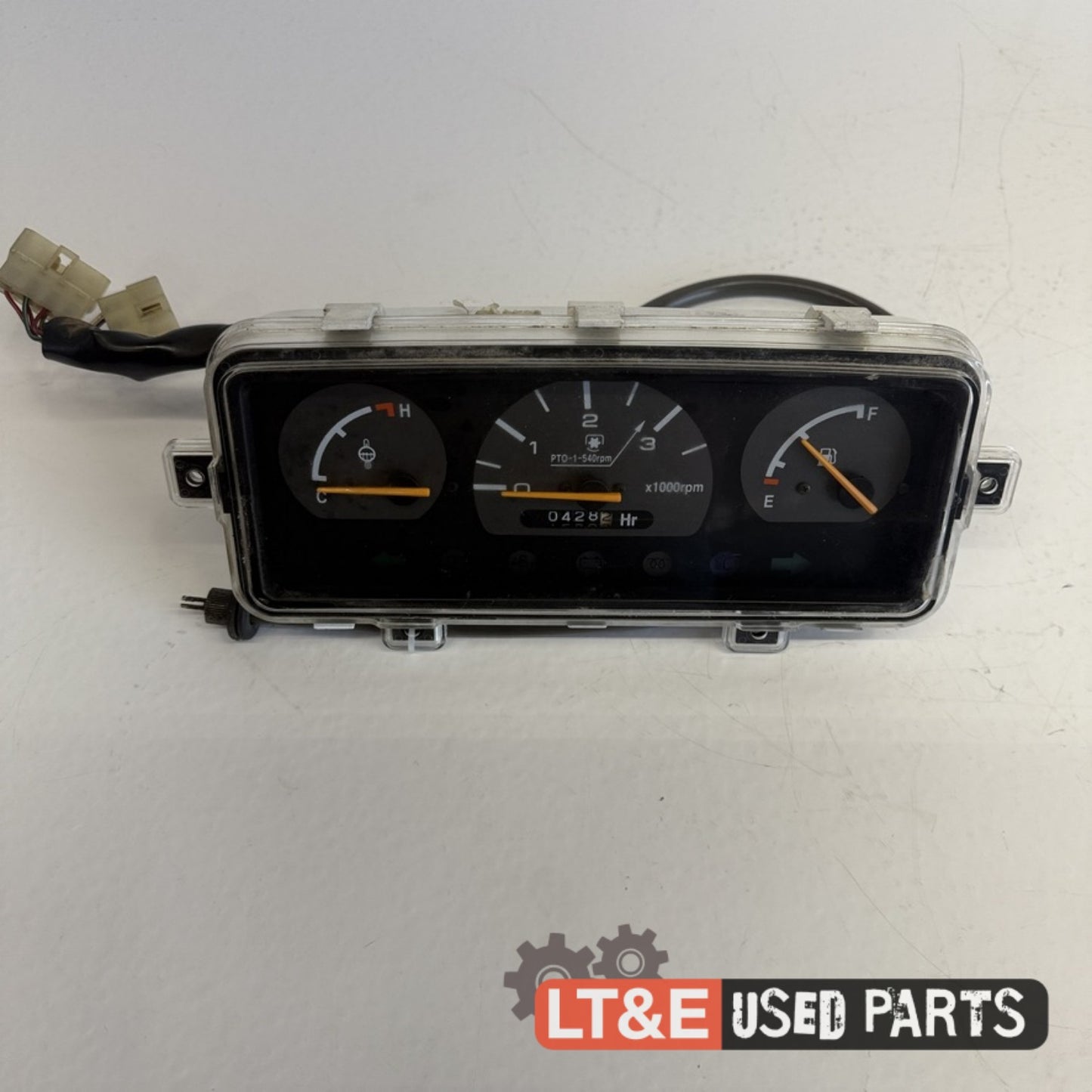 INSTRUMENT CLUSTER WITH TACH CABLE