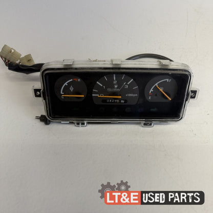 INSTRUMENT CLUSTER WITH TACH CABLE