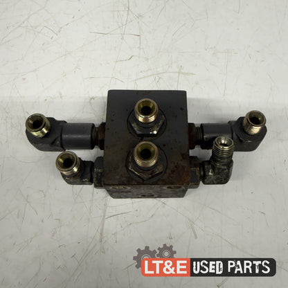 STEERING HOSE JUNCTION BLOCK